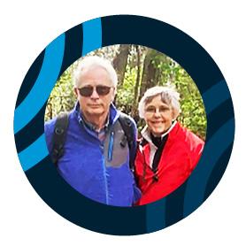 Man and woman with grey hair.